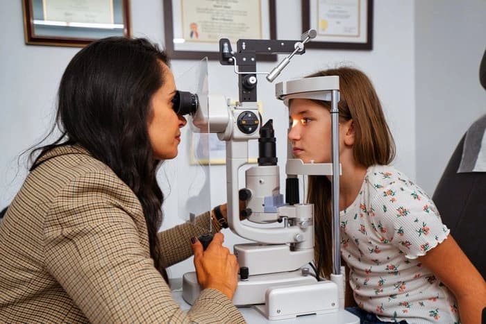 Dr. Sabahi with diagnostic equipment in the office